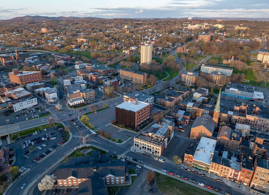 Troy, NY - Late Afternoon Spring Aerial View of Downtown Troy NY Located on the Hudson River